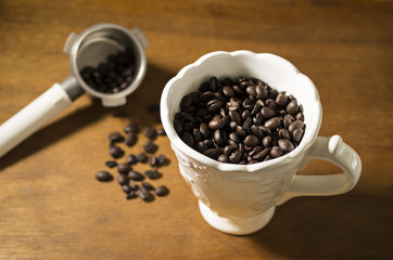 Coffee beans in a fancy mug