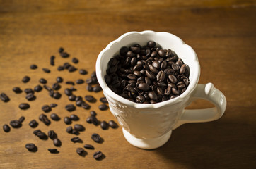 Coffee beans in a fancy mug