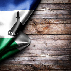 Flag of Lesotho on wooden boards