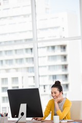 Fototapeta premium A beautiful working girl is working