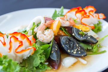 seafood spicy salad with preserved egg