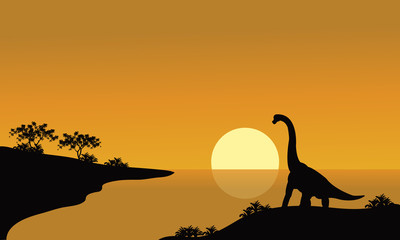Fototapeta na wymiar silhouette of brachiosaurus in river