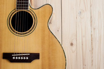 Fototapeta premium guitar acoustic on top wood table