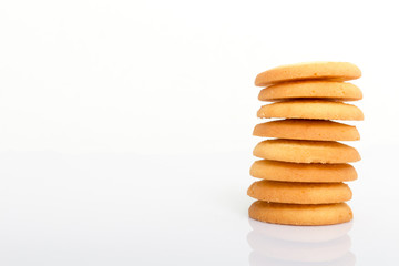 Stack of cookies isolated on white background with copy space