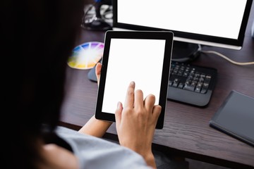 Woman watching her tablet computer