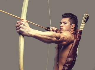Muscular male model with bow.