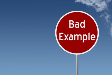 Round highway road sign with text bad example