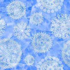 Boho ethnic seamless pattern with tribal elements. Hand drawn geometric mandalas on blue watercolor background. Vector illustration.