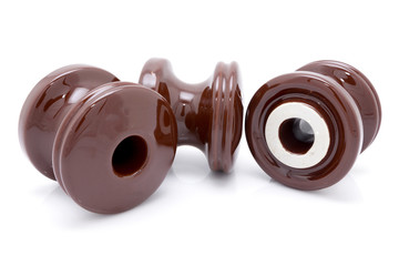 Electrical insulator on white background.