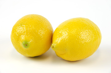 fresh lemons isolated on white background