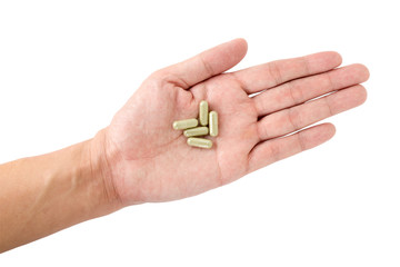 Isolated of Hand holding a pill capsule with clipping path