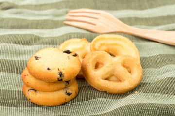 Butter cookies with wooden fork.