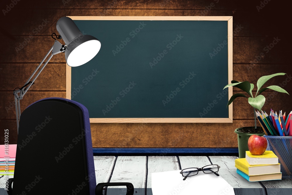 Poster composite image of a desk with lamp and documents