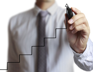 Businessman drawing graphics  growing graph