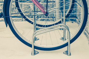 Locked bicycle at bicycle outdoor parking space
