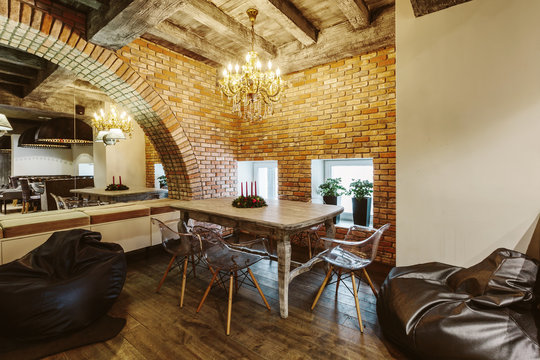 Modern Loft Cafe with brick wall interior design. Vintage luxury style decor