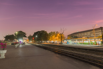 Passanger train station in the twilight.