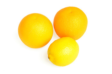 Oranges and lemon isolated on white background