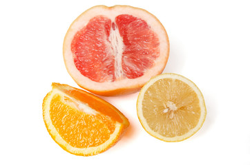 Grapefruit, orange and lemon isolated on white
