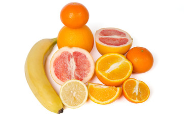 Grapefruits, oranges, kiwi, banana, mandarin and lemon isolated on white