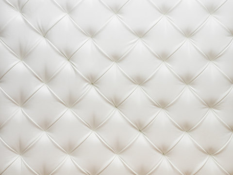 Background image of the white leather with pins