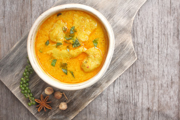 Stewpot of Indian curry and spices.