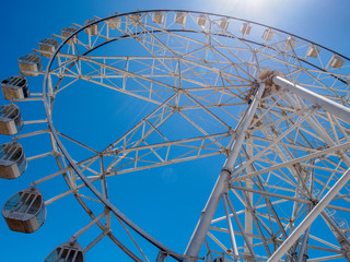 Ferris wheel with blue sky