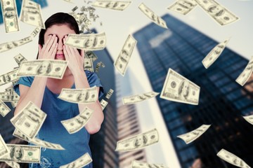 Composite image of pretty brunette with hands over eyes