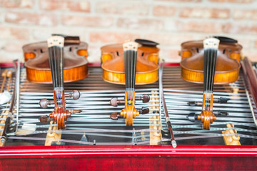 Fototapeta premium Violins and cimbalom. Selective focus.