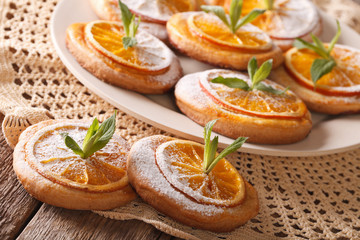 almond cookies with citrus close-up on a plate. horizontal
