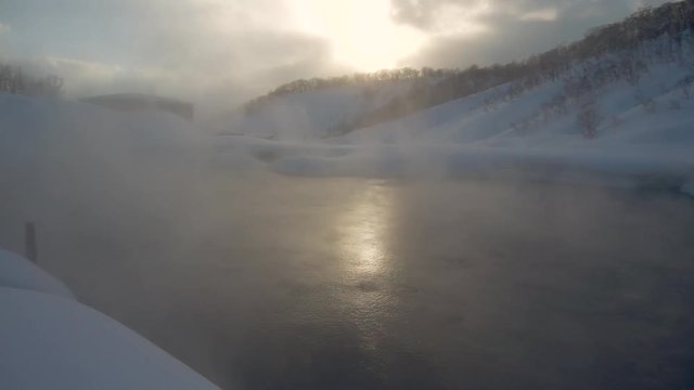 Natural Onsen Hot Spring Outdoors Steam and Sunset