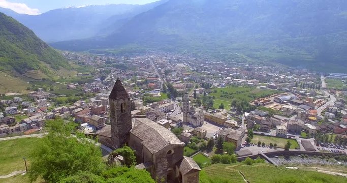 Aerial 4k - Tirano - Valtellina (IT) - Vista della Citt&agrave; e del Santuario della Beata Vergine 