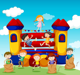 Children playing at the bouncing house