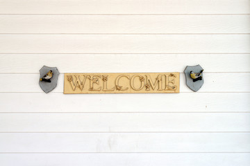 Welcome sign - letterpress wooden type vintage style on white wo