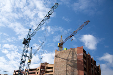 Construction site with cranes on sky background - 110149268