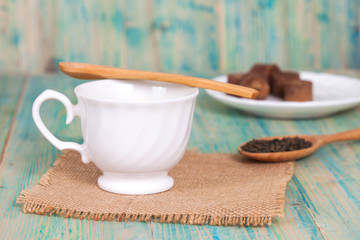 green tea with milk or hot matcha latte on wood