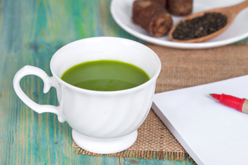 green tea with milk or hot matcha latte with cane