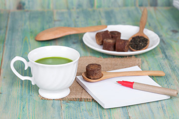 green tea with milk or hot matcha latte with paper
