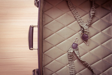 Open old suitcases. Brown retro suitcase. Vintage baggage.
