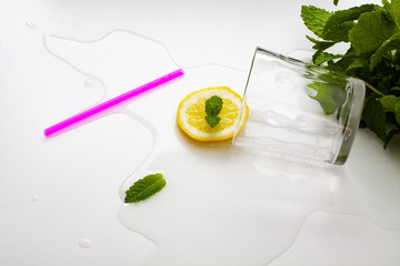 Overturned glass of homemade lemonade.