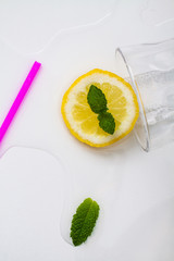 Overturned glass of homemade lemonade.