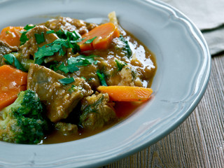  German traditional beef stew with carrots, dark beer