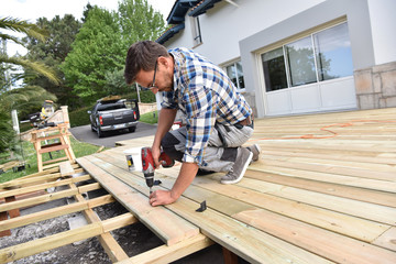 Carpenter building wooden deck