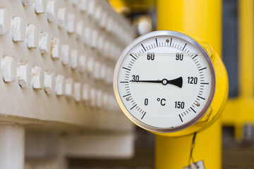 Temperature gauge to minitor temperature of gas at outlet of fin type cooler at oil and gas wellhead remote platform