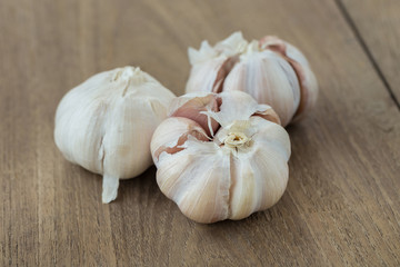 Fresh Garlic on the Wooden Table. Selective focus