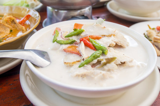 Chicken in coconut milk soup with chilly and lemon and galangal soup, Thai call Tom Kha Kai is delicious Thai food. 