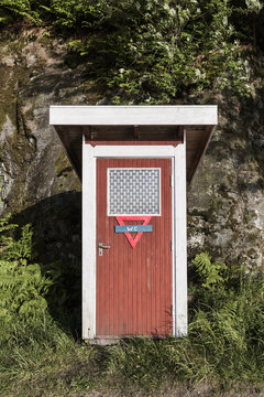 Outdoor outhouse toilet in nature