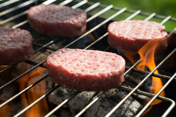 The burgers are fried on a grill