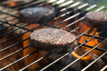 The burgers are fried on a grill