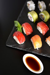 dish with various types of sushi,